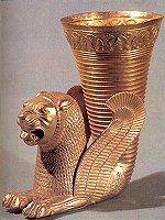 Golden drinking cup from the Achaemenian period, ornamented with a winged lion.